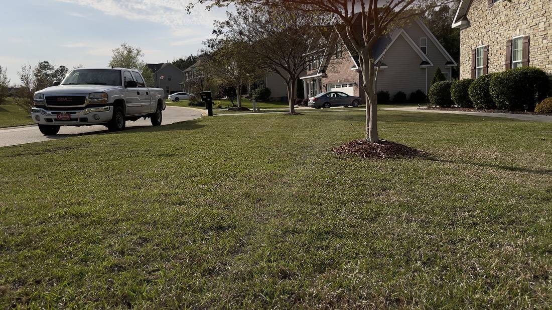 A freshly cut lawn on a Transitions route in Hope Mills
